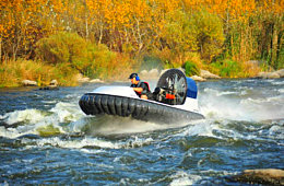 Personal hovercraft on rapids river