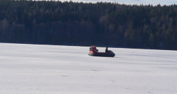 Frozen lake, flying a hovercraft, ice fishing